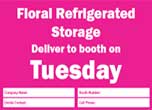 Pink background with white text announcing floral refrigerated storage delivery on Tuesday.