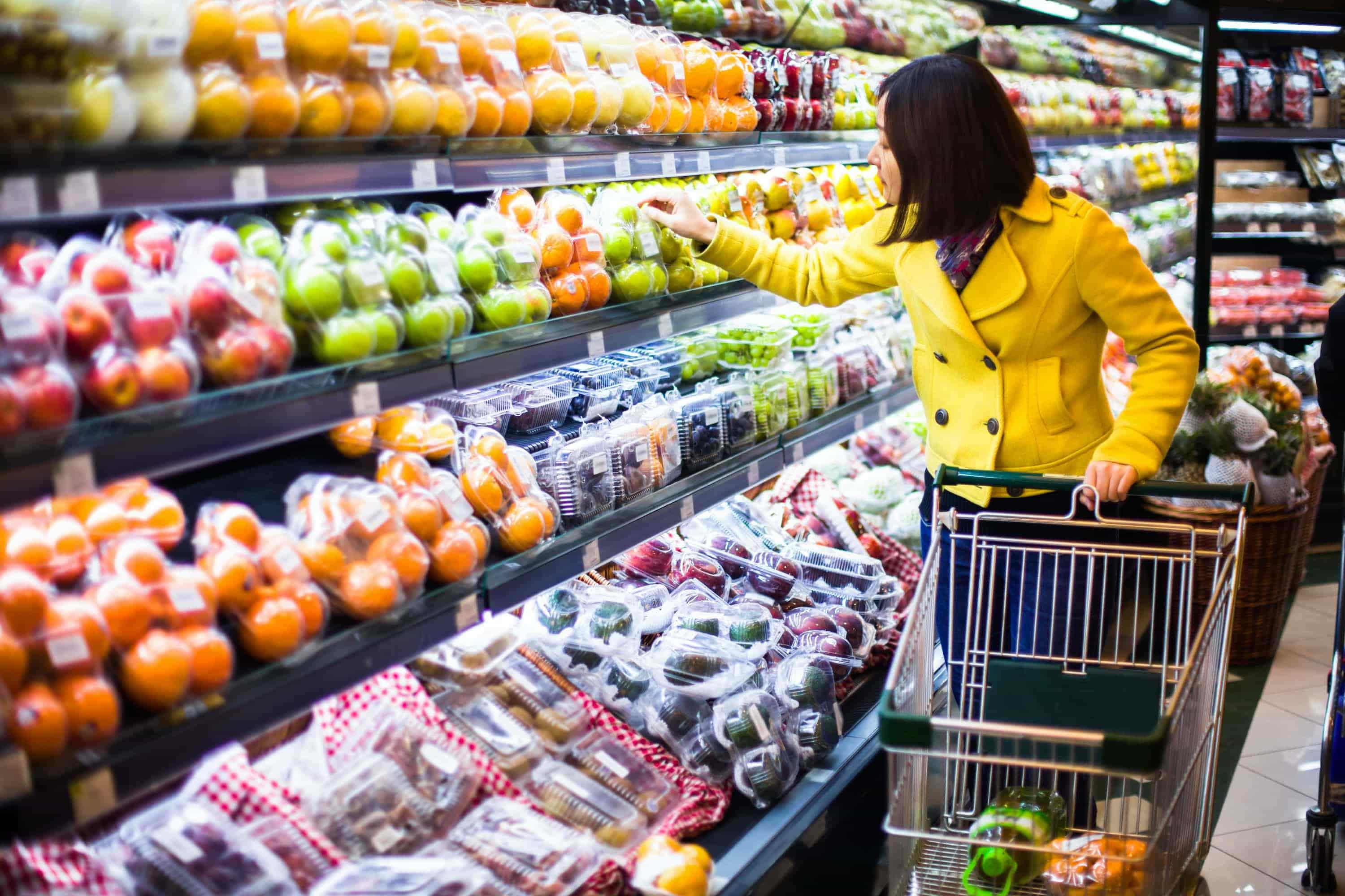 The fresh produce aisle of a Schnucks grocery store with colorful fresh  fruits and vegetables ready to be purchased by consumers. Photos